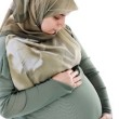 Pregnant muslim woman with happy expression