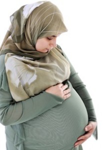 Pregnant  muslim woman with happy expression